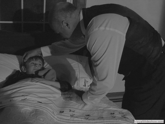 Grandpa tucks in David and Ginger